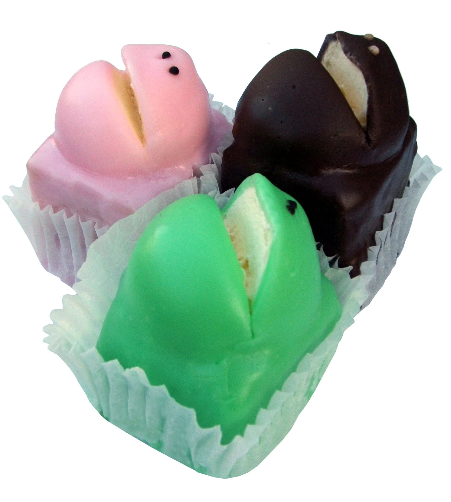 Three small frog-shaped cakes with pink, green and chocolate icing